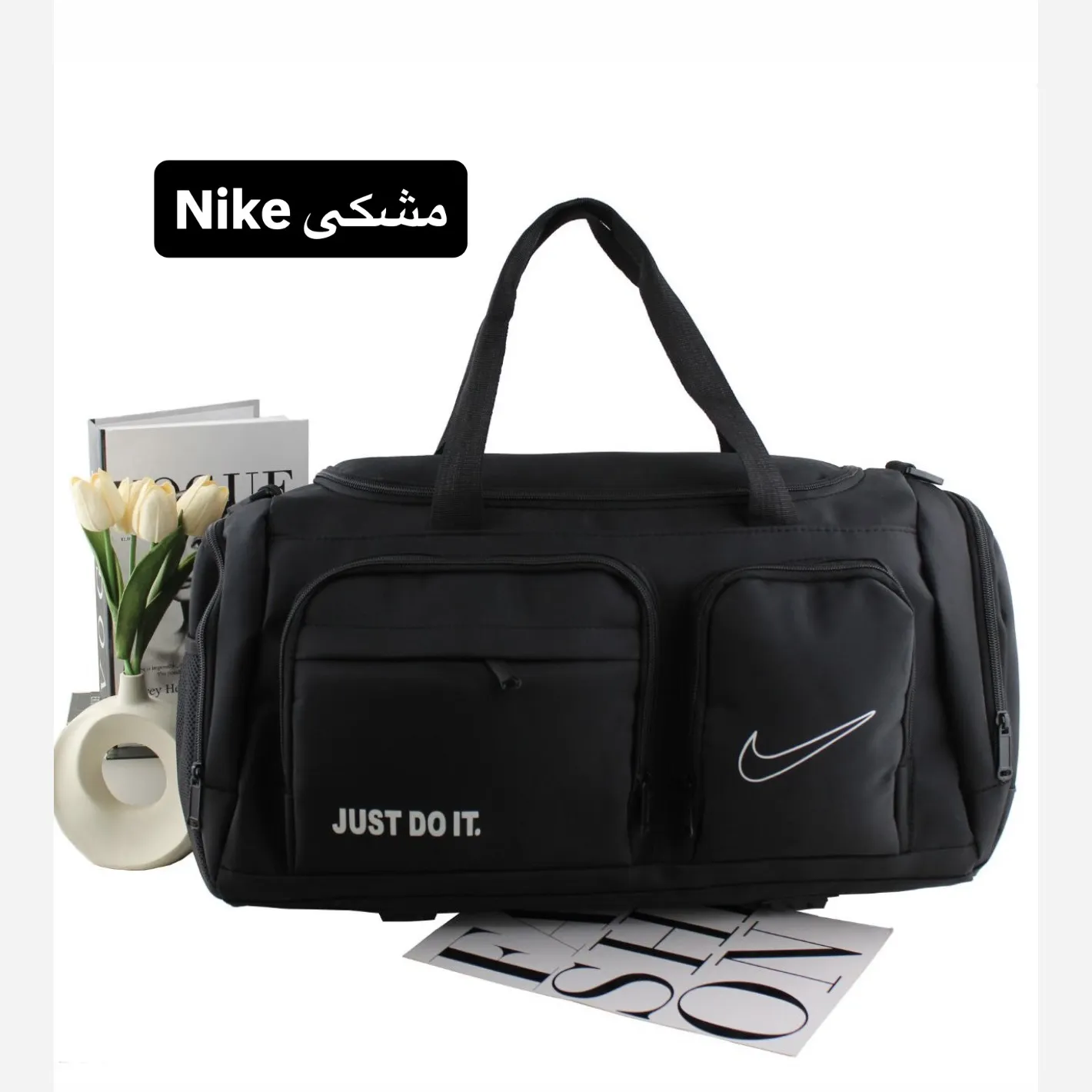 ساک ورزشی و اسپرت پارچهای با بند بلند و 7 جیب بیرونی ابعاد 55 در 33 در 20 سانتیمتر