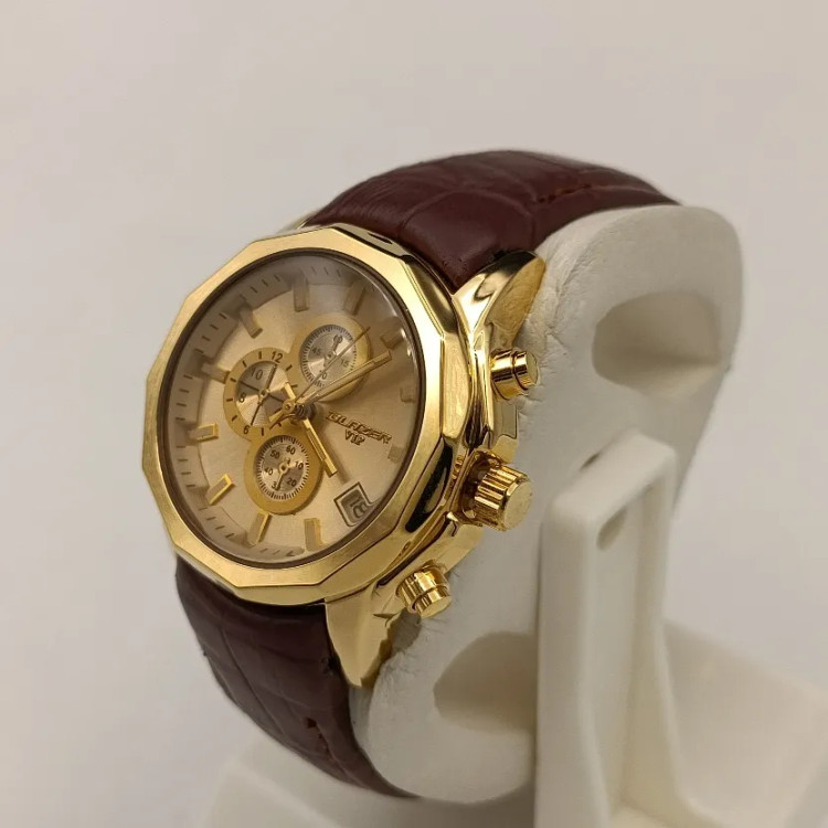 ساعت مچی زنانه بلیزر بند چرمی طرح سه موتور قاب چند ضلعی صفحه شامپاینی طلایی